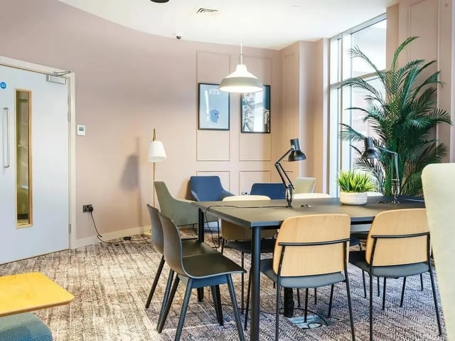 Tables chairs lamps plants pictures study area at COSMOS in Sheffield Student Accommodation