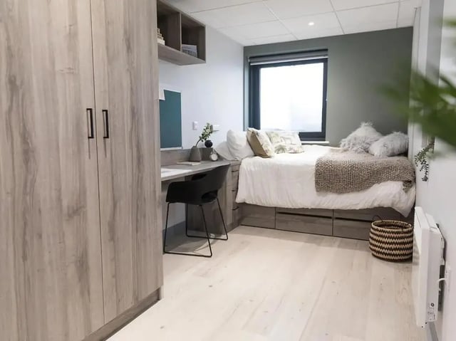 Bed desk wardrobe and storage bedroom at Crown Place Swansea in Swansea Student Accommodation