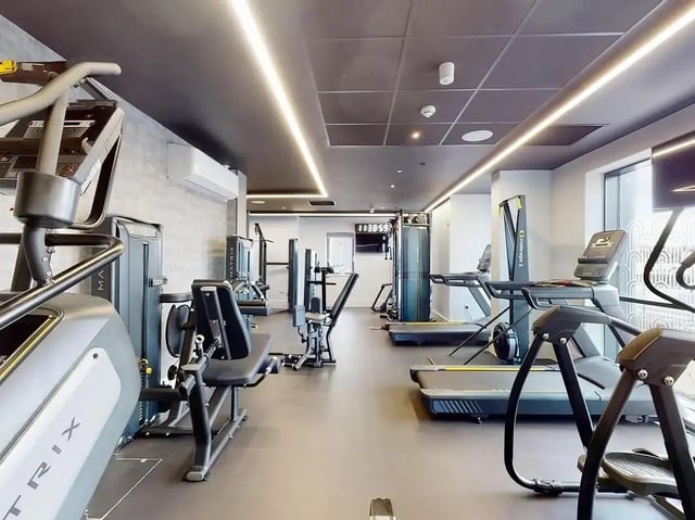 Gym with treadmills weight machines fitness area at Crown Place Swansea in Swansea Student Accommodation