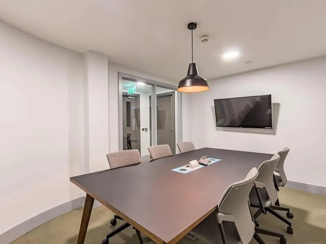 Table chairs television meeting room at ViBe Student Living in Kingston Upon Thames Student Accommodation
