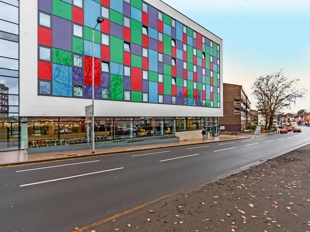Colorful modern building with ground floor common area exterior at ViBe Student Living in Kingston Upon Thames Student Accommodation