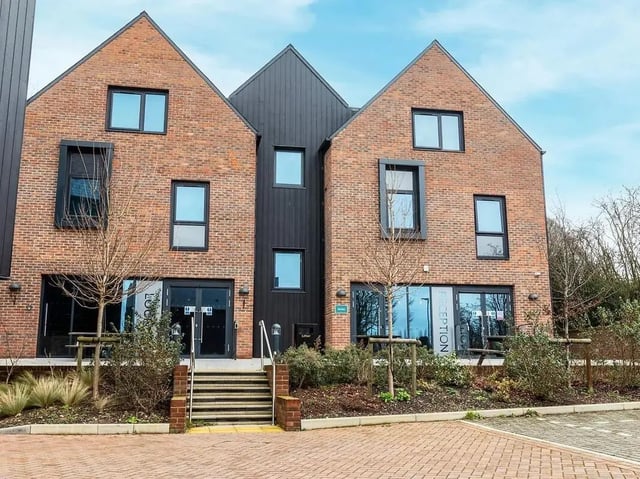 Brick building with glass doors and windows exterior at Elmstead Place in Colchester Student Accommodation