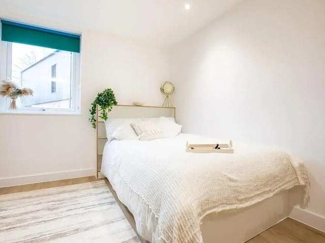 Bed with white linens tray globe lamp Bedroom at Elmstead Place in Colchester Student Accommodation