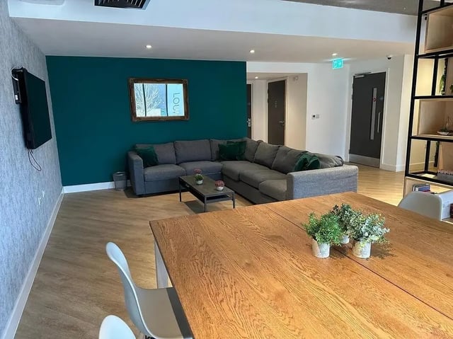Sectional sofa coffee table and dining table living room at Elmstead Place in Colchester Student Accommodation