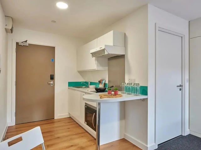Kitchenette with counter and microwave kitchen at Grand Felda House in Wembley Student Accommodation