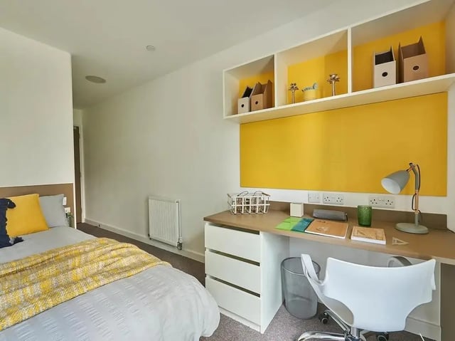 Bed desk radiator shelving study area bedroom at Grand Felda House in Wembley Student Accommodation