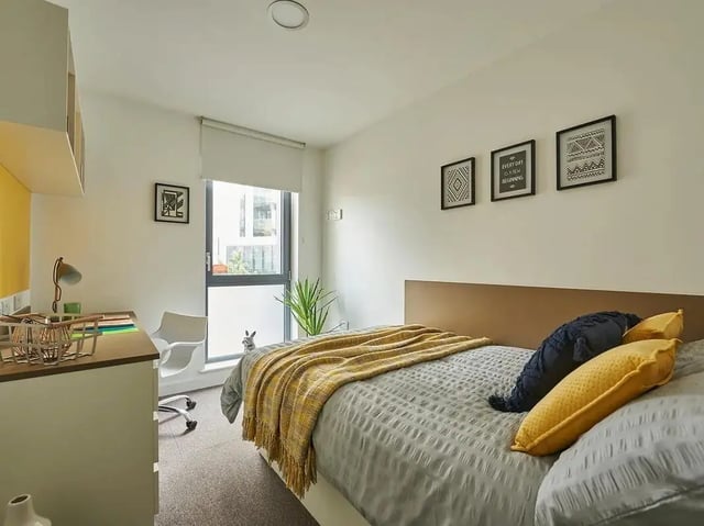 Bed desk lamp window artwork bedroom at Grand Felda House in Wembley Student Accommodation