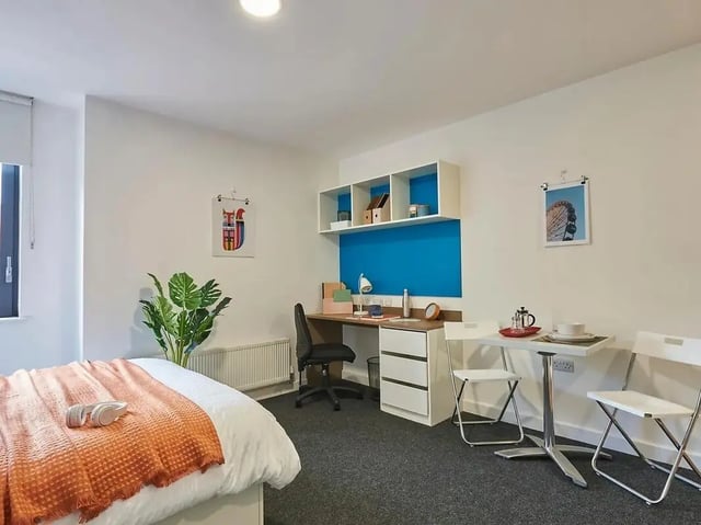 Bed desk chair table and chairs student accommodation room at Grand Felda House in Wembley Student Accommodation