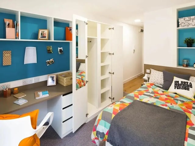 Bed desk shelves wardrobe with mirror bedroom at Grand Felda House in Wembley Student Accommodation