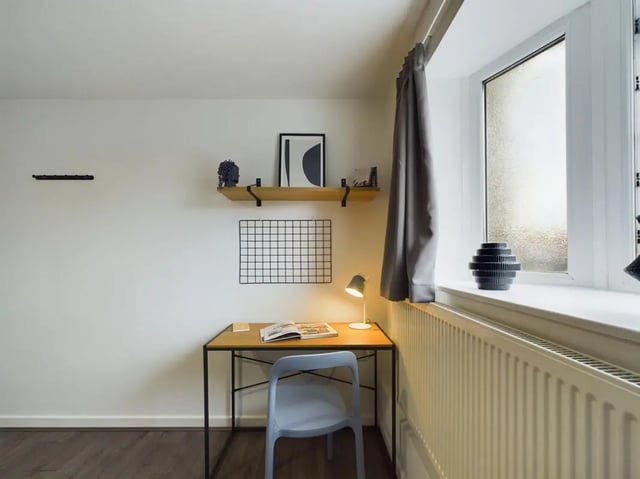 Desk chair lamp and shelf study area at 6 Bedroom House at 2, Flat 2, Windsor House, Clint Road West in Liverpool Student Accommodation