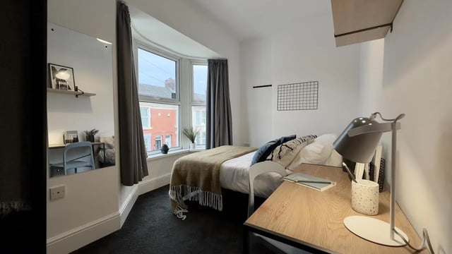 Bed desk lamp mirror with desk bedroom study area at 4 Bedroom House at 126, Empress Road in Liverpool Student Accommodation