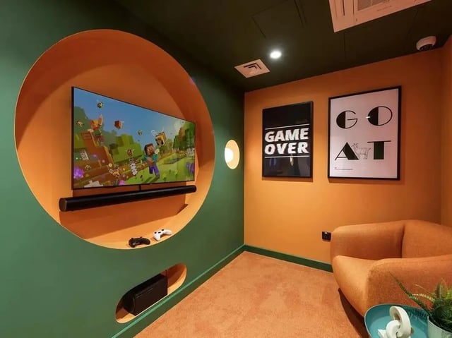 TV soundbar controllers and console visible in lounge at Yugo Bottleworks in Cork Student Accommodation