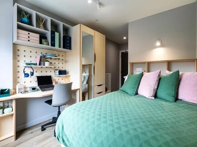 Desk laptop headphones wardrobe bed bedroom at Yugo Bottleworks in Cork Student Accommodation