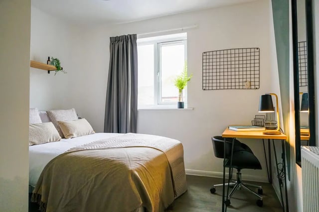 Bed desk chair plant and mirror bedroom at 6 Bedroom House at 64A, Monson Street in Lincoln Student Accommodation