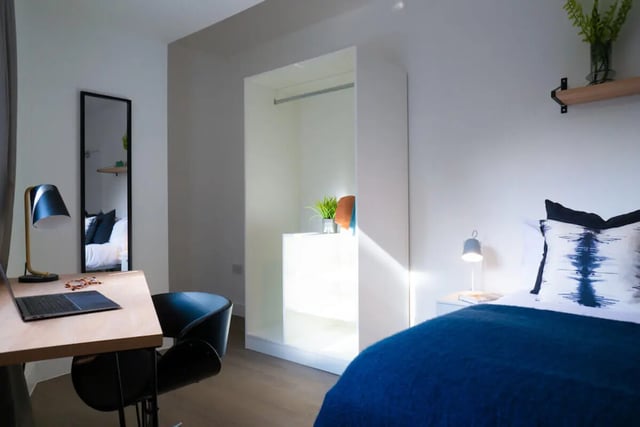Desk mirror wardrobe and bed bedroom at 12 Bedroom House at Freya House, Thesiger Street in Lincoln Student Accommodation