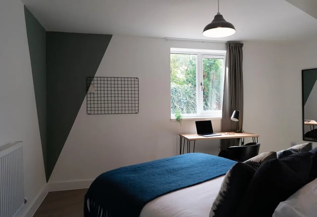 Bed desk laptop window and wall decor bedroom at 12 Bedroom House at Freya House, Thesiger Street in Lincoln Student Accommodation