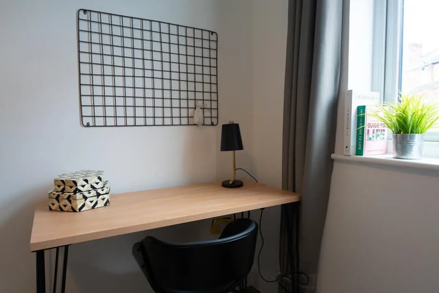 Desk with lamp wire grid and plant study area at 12 Bedroom House at Freya House, Thesiger Street in Lincoln Student Accommodation