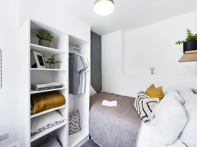Wardrobe bed with pillows and blanket bedroom at 5 Bedroom House at 31, Gladstone Terrace in Lancaster Student Accommodation