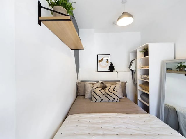 Bed closet shelf plant art bedroom at 5 Bedroom House at 31, Gladstone Terrace in Lancaster Student Accommodation