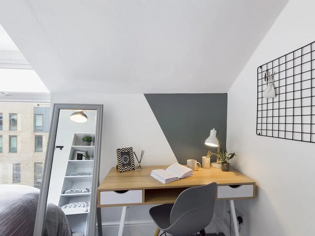 Desk with lamp mirror shelves bedroom study area at 5 Bedroom House at 31, Gladstone Terrace in Lancaster Student Accommodation