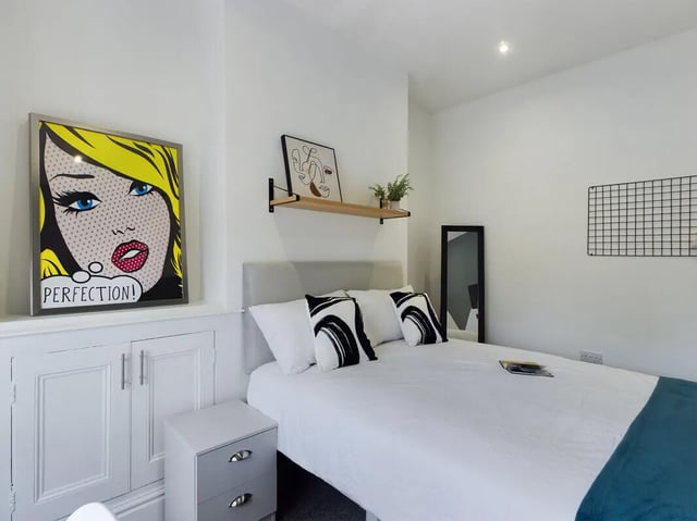 Pop art print bed mirror bedside cabinet bedroom at 4 Bedroom House at 107, Hall Lane in Liverpool Student Accommodation