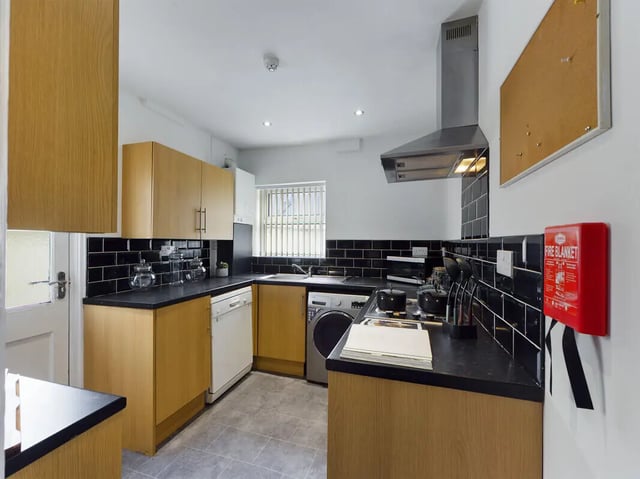 Cabinets dishwasher washing machine cooker kitchen at 4 Bedroom House at 107, Hall Lane in Liverpool Student Accommodation