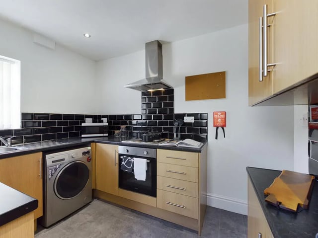 Washing machine oven microwave and fire blanket kitchen at 4 Bedroom House at 107, Hall Lane in Liverpool Student Accommodation