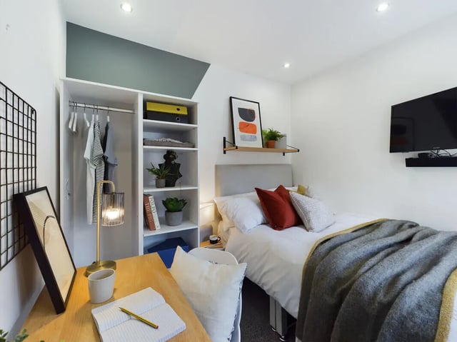 Bed wardrobe desk study area bedroom at 6 Bedroom House at 154, Empress Road in Liverpool Student Accommodation