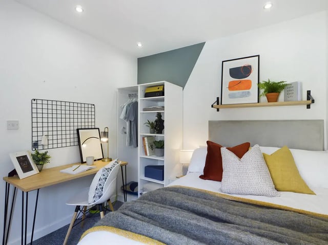 Desk wardrobe bed and art Bedroom at 6 Bedroom House at 154, Empress Road in Liverpool Student Accommodation