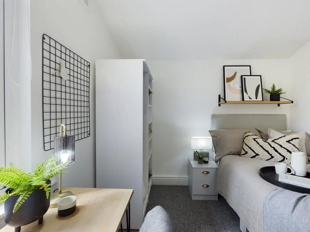 Desk bedside table and bed bedroom at 6 Bedroom House at 154, Empress Road in Liverpool Student Accommodation