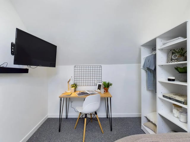 Desk chair TV shelves study area at 6 Bedroom House at 154, Empress Road in Liverpool Student Accommodation