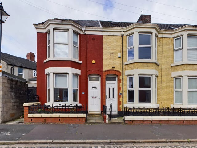 Terraced houses with bay windows exterior at 6 Bedroom House at 154, Empress Road in Liverpool Student Accommodation