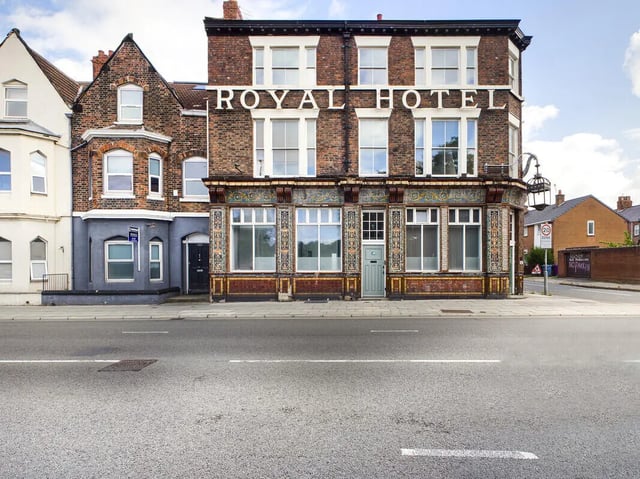 Brick building Royal Hotel sign large windows exterior at 8 Bedroom House at 213, Smithdown Road in Liverpool Student Accommodation