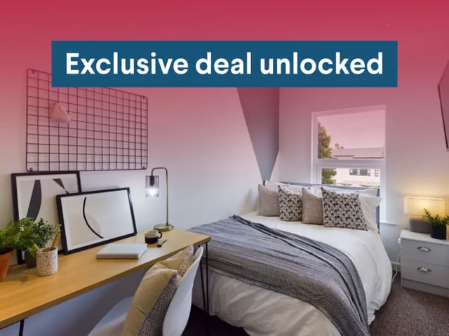 Bed desk framed art and lamp bedroom at 8 Bedroom House at 4, Ossory Street in Manchester Student Accommodation