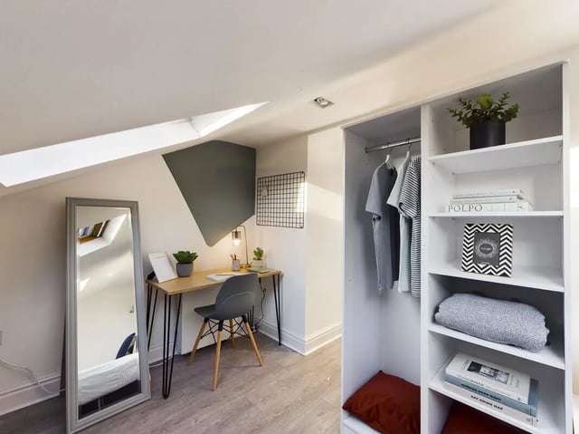 Desk chair mirror wardrobe and shelves bedroom at 7 Bedroom House at 39, Ossory Street in Manchester Student Accommodation