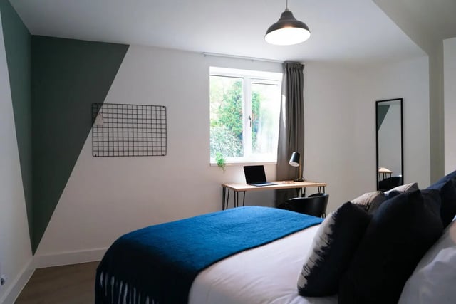 Bed desk mirror laptop study area bedroom at 3 Bedroom House at 68, St. Bees Close in Manchester Student Accommodation