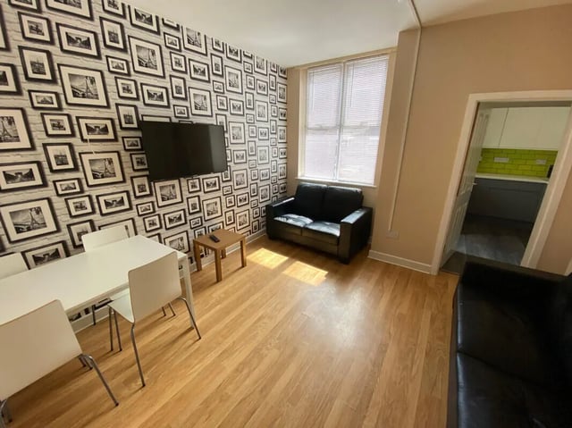 Sofa table TV dining set living room at 4 Bedroom House at 16, Lovat Road in Preston Student Accommodation