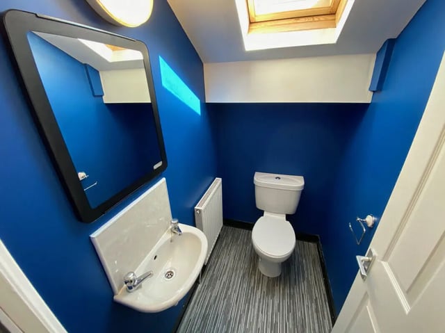 Sink toilet radiator mirror bathroom at 6 Bedroom House at 59, Trafford Street in Preston Student Accommodation