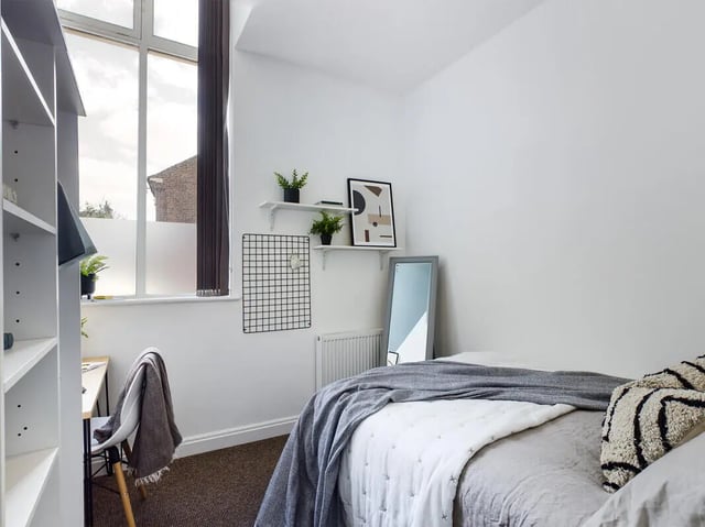 Bed desk chair shelving unit framed art mirror bedroom at 6 Bedroom House at 146, Jubilee Drive in Liverpool Student Accommodation
