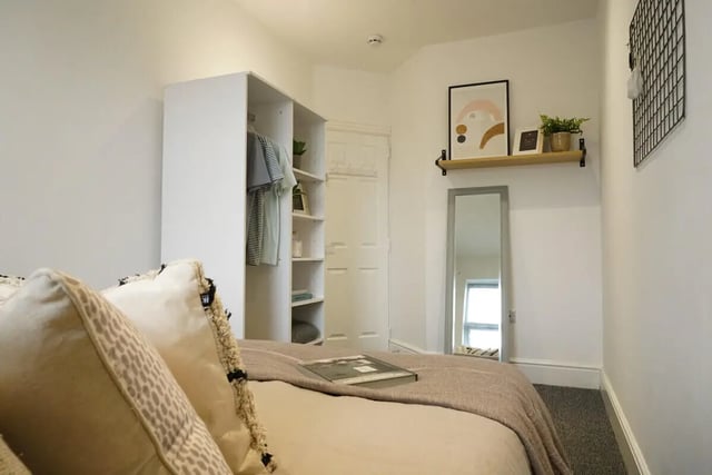Closet and bed with pillows Bedroom at 6 Bedroom House at 148, West Parade in Lincoln Student Accommodation