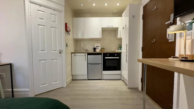 Compact kitchen with oven fridge sink and cupboards kitchen at 6 Bedroom House at 12, Studios at, Richmond Road in Lincoln Student Accommodation