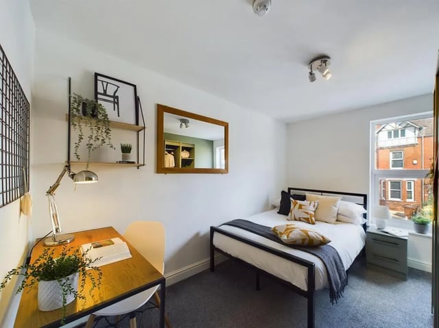 Bed desk mirror and plants bedroom at 6 Bedroom House at 73, West Parade in Lincoln Student Accommodation