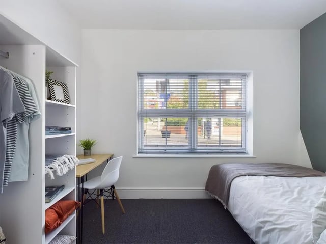 Bed wardrobe desk and chair bedroom at 6 Bedroom House at 47, Monks Road in Lincoln Student Accommodation