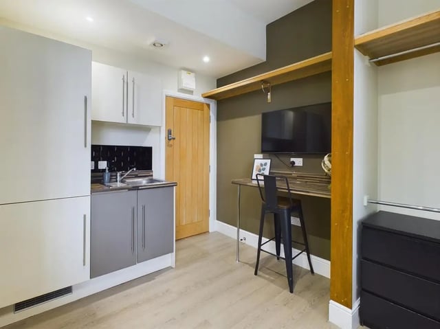Compact kitchen desk TV dresser and door studio apartment at 7 Bedroom House at 19, Studios at, St. Catherines in Lincoln Student Accommodation