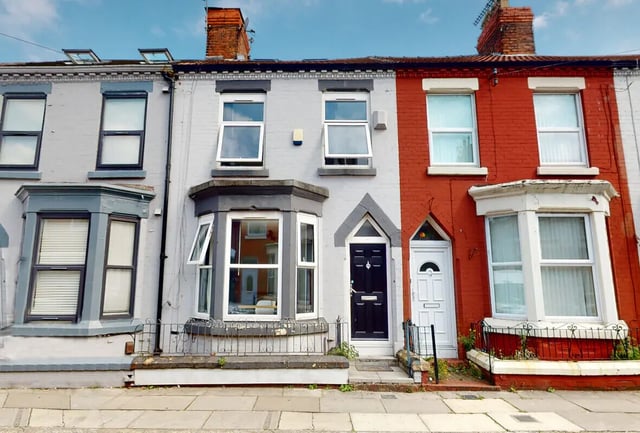 Terraced houses with bay windows and doors Exterior at 6 Bedroom House at 18, Halsbury Road in Liverpool Student Accommodation