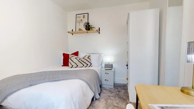 Bed bedside table shelf art bedroom at 6 Bedroom House at 18, Halsbury Road in Liverpool Student Accommodation
