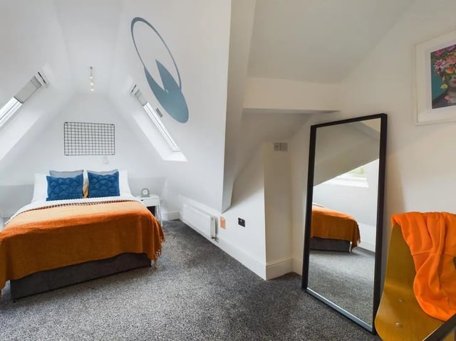 Bed with orange throw grey carpet Bedroom at 4 Bedroom House at Flat 5, 265, Edge Lane in Liverpool Student Accommodation
