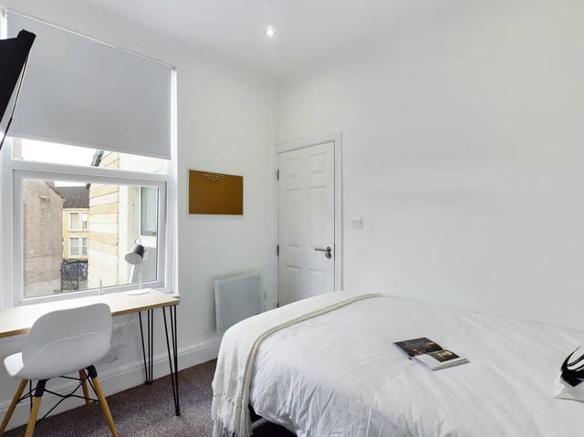 Bed desk chair and window bedroom at 7 Bedroom House at 8, Well Meadow Drive in Sheffield Student Accommodation