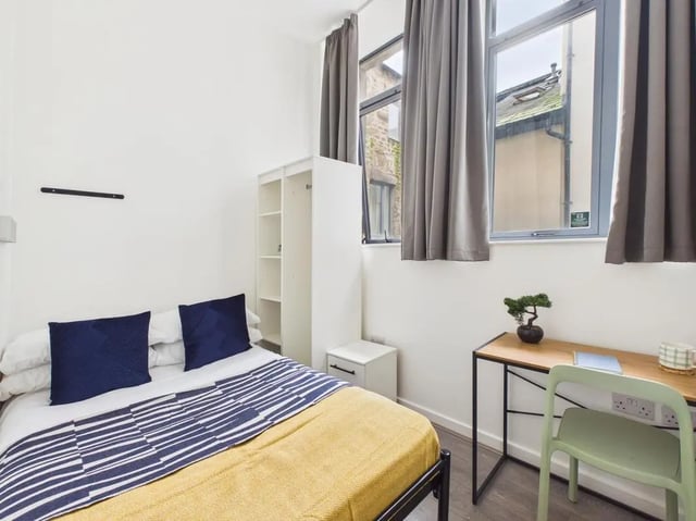 Bed wardrobe desk and chair bedroom at 3 Bedroom House at Flat 3, 18, China Street in Lancaster Student Accommodation