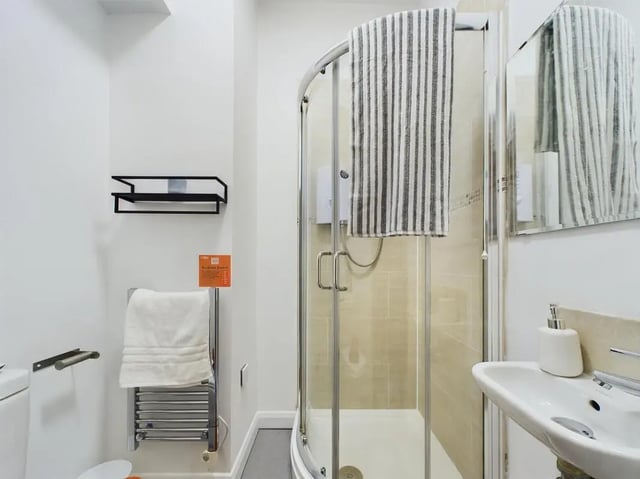 Shower sink towel rack and shelf bathroom at 5 Bedroom House at Flat 4, 18, China Street in Lancaster Student Accommodation